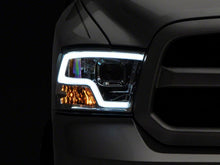 Load image into Gallery viewer, Raxiom 09-18 Dodge RAM 1500 Non-Projector LED Halo Headlights- Chrome Housing (Clear Lens)