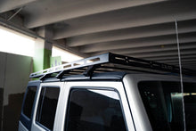 Load image into Gallery viewer, DV8 Offroad 07-18 Jeep Wrangler JK Full-Length Roof Rack