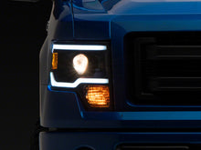 Load image into Gallery viewer, Raxiom 09-14 Ford F-150 Axial Series Projector Headlights w/ LED Light Bar- Blk Housing (Clear Lens)