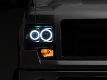 Load image into Gallery viewer, Raxiom 09-14 Ford F-150 Super White LED Halo Projector Headlights- Blk Housing (Clear Lens)