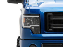 Load image into Gallery viewer, Raxiom 09-14 Ford F-150 Axial Series Headlight w/ SEQL LED Bar- Blk Housing (Clear Lens)