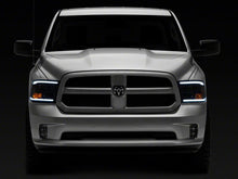 Load image into Gallery viewer, Raxiom 09-18 Dodge RAM 1500/2500/3500 Axial Series Headlights w/ LED Bar- Blk Housing (Clear Lens)