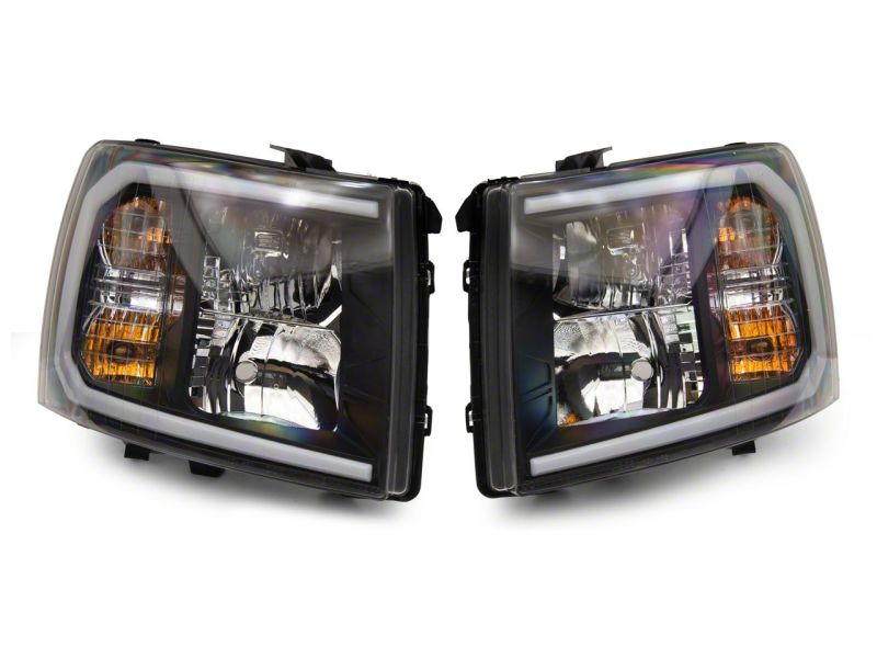 Raxiom 07-13 Chevrolet Silverado 1500 Axial Headlights w/ SEQL LED Bar- Blk Housing (Clear Lens)