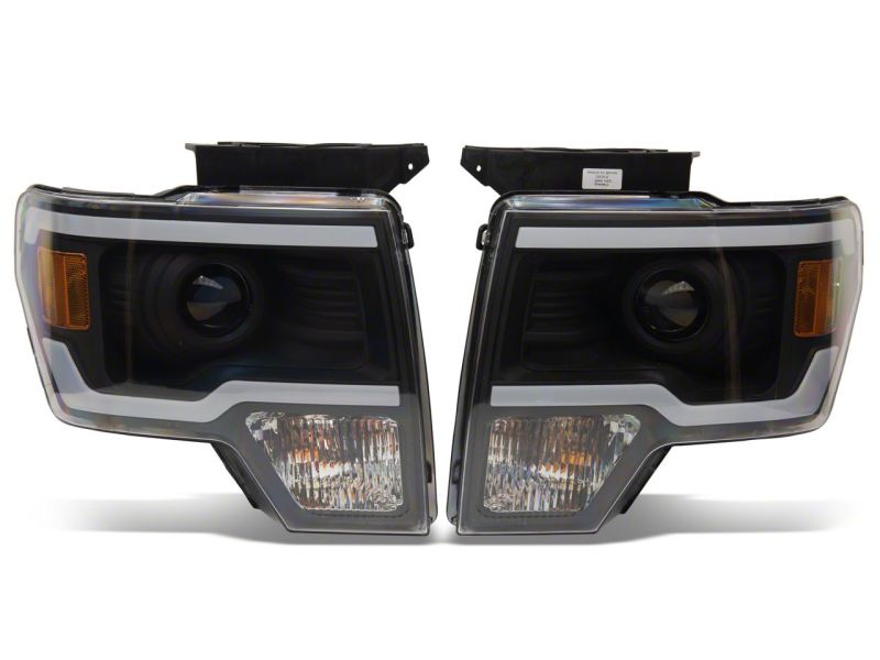 Raxiom 09-14 Ford F-150 Axial Series Projector Headlights w/ LED Light Bar- Blk Housing (Clear Lens)