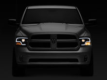 Load image into Gallery viewer, Raxiom 09-18 RAM 1500 LED Halo Projector Headlights- Black Housing (Clear Lens)