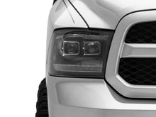 Load image into Gallery viewer, Raxiom 09-18 RAM 1500 LED Projector Headlights w/ Switchback Turn Signals- Blk Housing (Clear Lens)