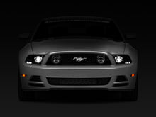 Load image into Gallery viewer, Raxiom 13-14 Ford Mustang w/ Factory HIDLED Halo Projector Headlights- Black Housing (Smoked Lens)