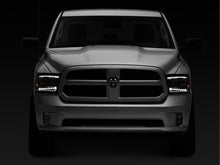 Load image into Gallery viewer, Raxiom 09-18 RAM 1500 LED Projector Headlights w/ Switchback Turn Signals- Blk Housing (Clear Lens)